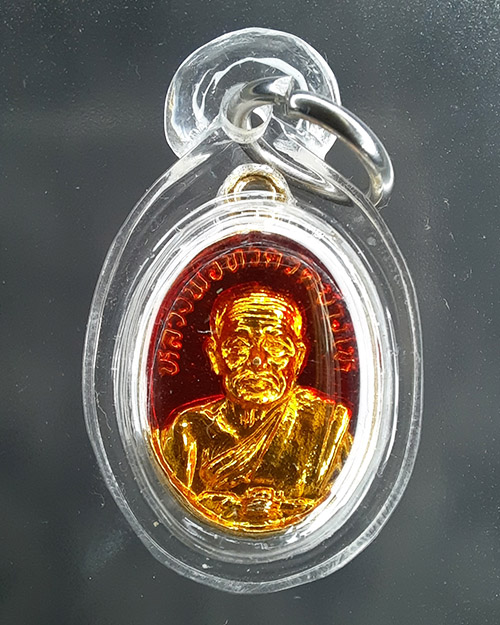เม็ดแตงลูกเคลือบแดง ปี22 หลวงพ่อทวด วัดช้างให้ บล็อคทองคำ