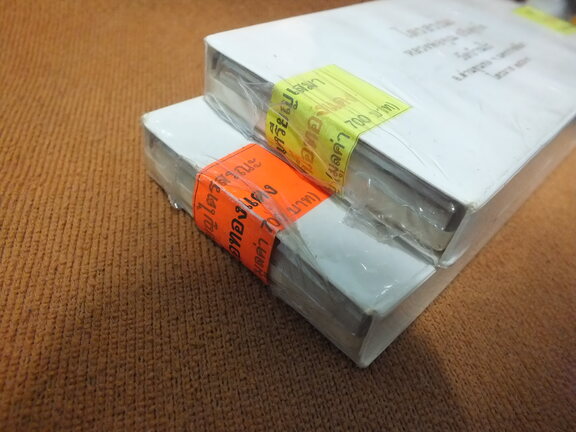 เหรียญไข่ + เสมา หลวงพ่อคูณ วัดบ้านไร่ รุ่นไตรสรณะ ปี 57 ชุดเนื้อทองแดง ยังไม่แกะซีล ลุ้นเลขสวย