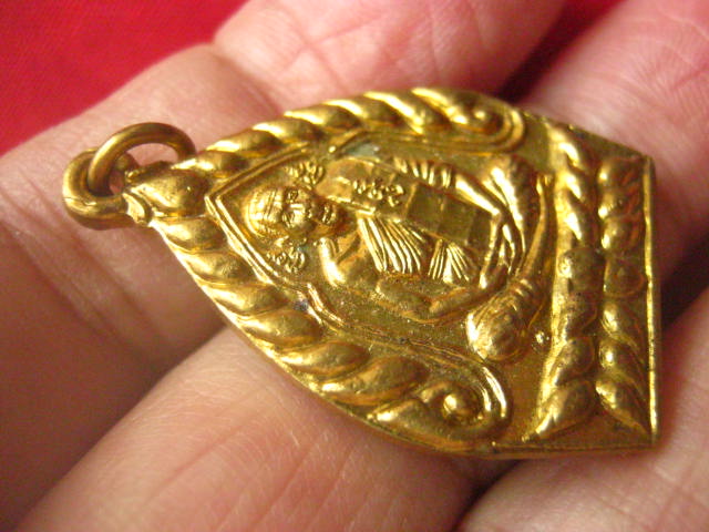 เหรียญหลวงพ่อทา วัดพะเนียงแตก นครปฐม รุ่นเจ้าสัวอุดมทรัพย์ ปี 2547