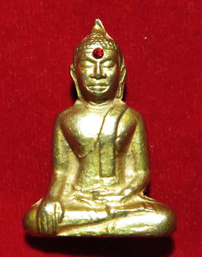 พระกริ่งฝังพลอยแดง