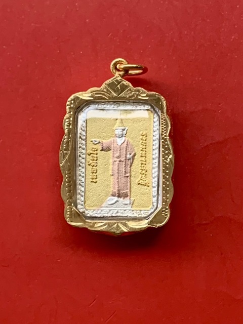 หลวงพ่อทันใจ รวยเศรษฐี  ด้านหลังยันต์ 5 แถว