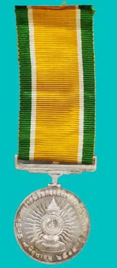 เหรียญแพรแถบเนื้อเงิน ในหลวงร.9 ที่ระลึกพระราชพิธีฉลองสิริราชสมบัติครบ25ปี เนื้อเงิน ปี 2514