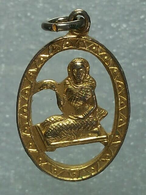 เหรียญฉลุนางกวัก หลังนำลาภ เนื้อกะไหล่ ไม่ทราบวัด