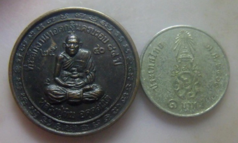 **วัดใจ**เหรียญที่ระลึกงานทอดกฐินครบรอบ ๘๔ ปี หลวงปู่ทิม วัดพระขาว จ.อยุธยา ปี๒๕๔๐**หลังพระปิดตา สวย