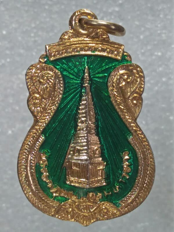 เหรียญพระธาตุพนม หลังพระประจำวันพุธ เนื้อกะไหล่ทองลงยา