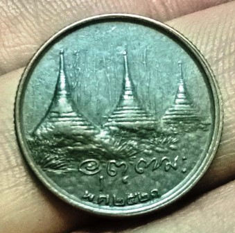 เหรียญขอบสตางค์ หลวงพ่ออุตตมะ วัดวังก์วิเวการาม ปี 2521