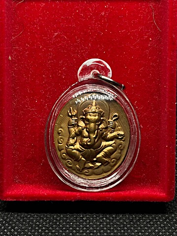 เหรียญพระพิฆเนศ หลังพระราหู เนื้อทองแดง เลี่ยมพร้อมใช้