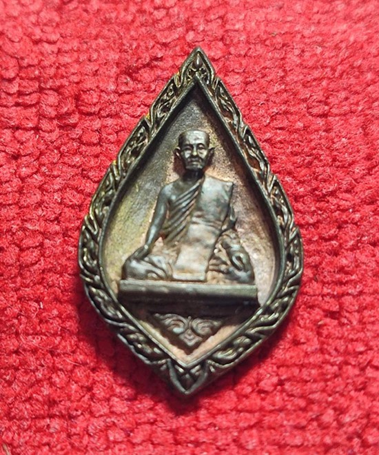 เหรีญญหูไห หลวงพ่อห้อม วัดคูหาสุวรรณ  จังหวัดสุโขทัย