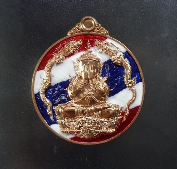 เหรียญพระปิดตามังกรคู่หลวงพ่อพัฒน์ วัดห้วยด้วน จ.นครสวรรค์ เนื้อทองแดงลงยาลายธงชาติ ปี ๒๕๖๕ สวยครับ