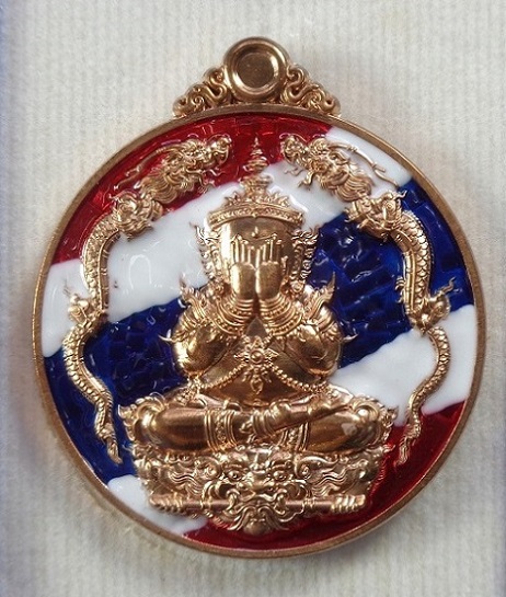 เหรียญพระปิดตามังกรคู่หลวงพ่อพัฒน์ วัดห้วยด้วน จ.นครสวรรค์ เนื้อทองแดงลงยาลายธงชาติ ปี ๒๕๖๕ สวยครับ