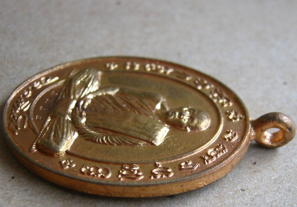 เหรียญหล่อโบราณ รุ่น เศรษฐีเจ้าสัว หลวงปู่บุญหนา วัดป่าโสตถิพล จ.สกลนคร ปี2555 หมายเลข1354พร้อมกล่อง