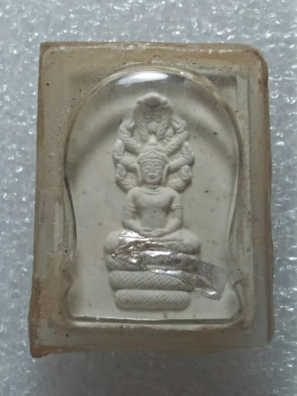 พระนาคปรกเนื้อผง ฝังตะกรุดเงิน หลวงปู่บุดดา ถาวโร เลี่ยมพลาสติก