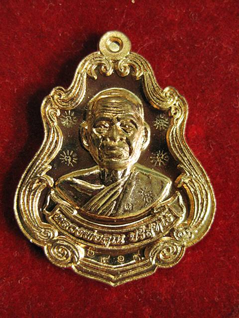 เหรียญหลวงพ่อคูณพิมพ์ปาดตาลครึ่งองค์ พุทธคูณสยามมหาลาภ เนื้อทองแดงขัดเงา วัดใหม่อัมพวัน 