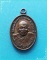 ..ลป.เครื่อง วัดเทพสิงหาร เหรียญเม็ดแตงเล็ก ครึ่งองค์ เนื้อทองแดง หลังยันต์..