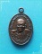 ..ลป.เครื่อง วัดเทพสิงหาร เหรียญเม็ดแตงเล็ก ครึ่งองค์ เนื้อทองแดง หลังยันต์..