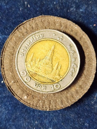 วัดป่าบ้านตาด จ.อุดรธานี พระผงชานหมากพิมพ์ล้อแม็คใหญ่. 2550 ขนาด 4 cm