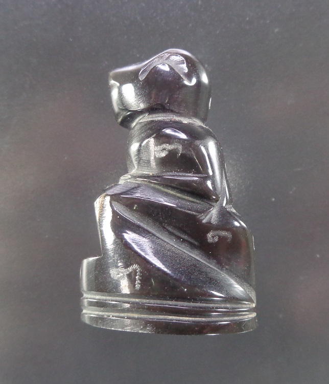 หนุมานแกะจากเขาควาย ขนาดความสูง 1.5 นิ้ว มีรอยจารมือรอบๆองค์ สวยครับ