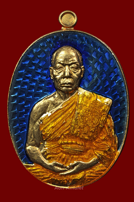 เหรียญเนื้อทองทิพย์ลงยาสีน้ำเงินจีวรเหลืองกรรมการ รุ่น มหาปราบ หลวงพ่อนัส วัดอ่าวใหญ่ พศ.2559 No.570