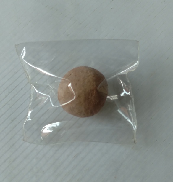 ลูกอมเนื้อผงไม่ทราบที่