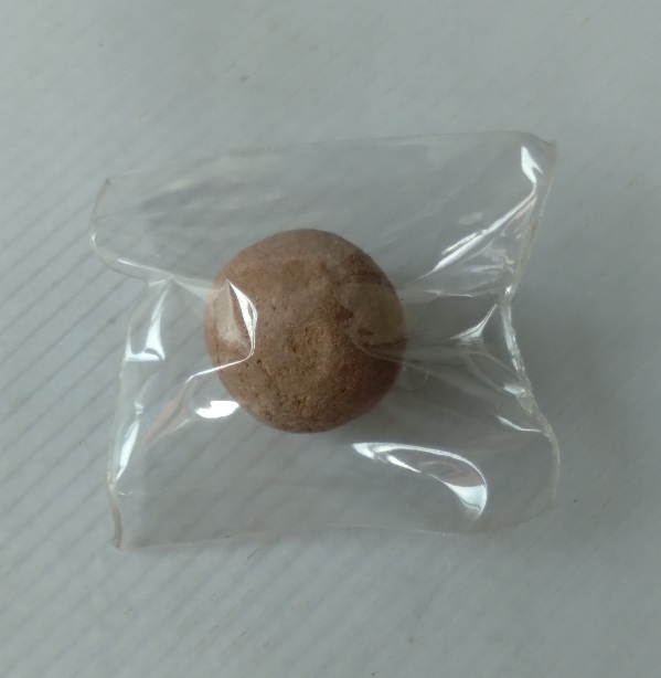 ลูกอมเนื้อผงไม่ทราบที่