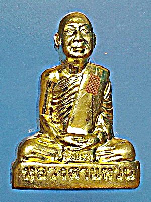  พระรูปเหมือนปั๊ม หลวงตาแหวน ทยาลุโก รุ่นแรก (ไตรมาส 56) เนื้อทองฝาบาตร ติดเกศา จีวร มีจาร สวยแชมป์ 