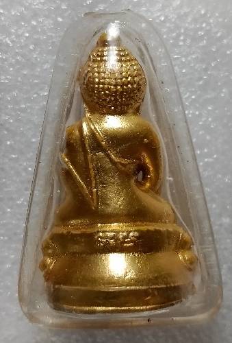 พระกริ่งเนื้อผง ลงลักปิดทอง วัดสุทันศ์ฯ ก้นจาร รุ่นไตรมาส ปี๓๔ เลี่ยมพลาสติกกันน้ำ 