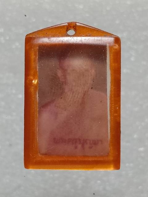 รูปถ่ายหลังยันต์พระครูบุญมา เลี่ยมเก่า 