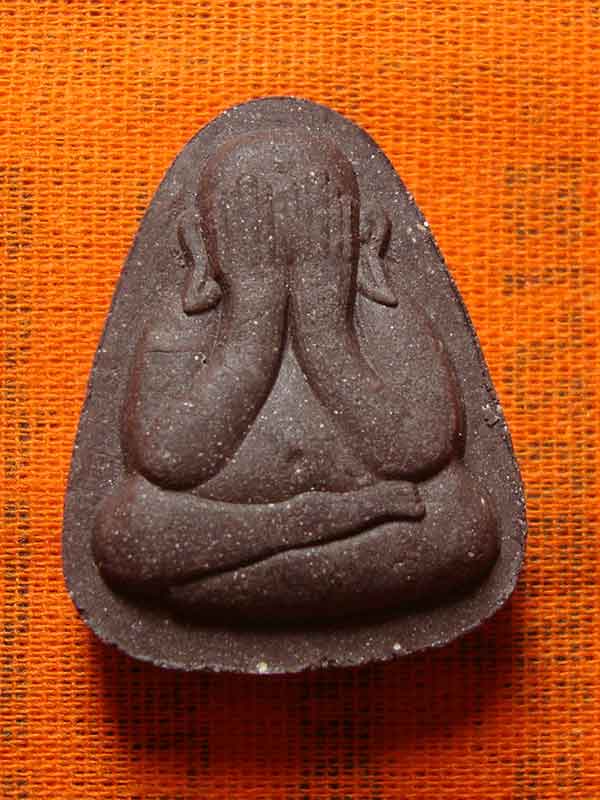 พระปิดตา ปลดหนี้ สมปรารถนา หลวงพ่อสุริยันต์ วัดป่าวังน้ำเย็น  เนื้อผงไม้ตะเคียน