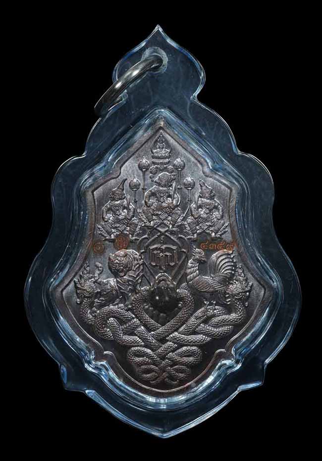 เหรียญพุทธศิลป์ไหว้ครู ๖๕ เนื้อทองแดง หลังอุดผงกรรมฐานติดเกศา หลวงปู่มหาศิลา สิริจันโท สวนสงฆ์แกเปะ