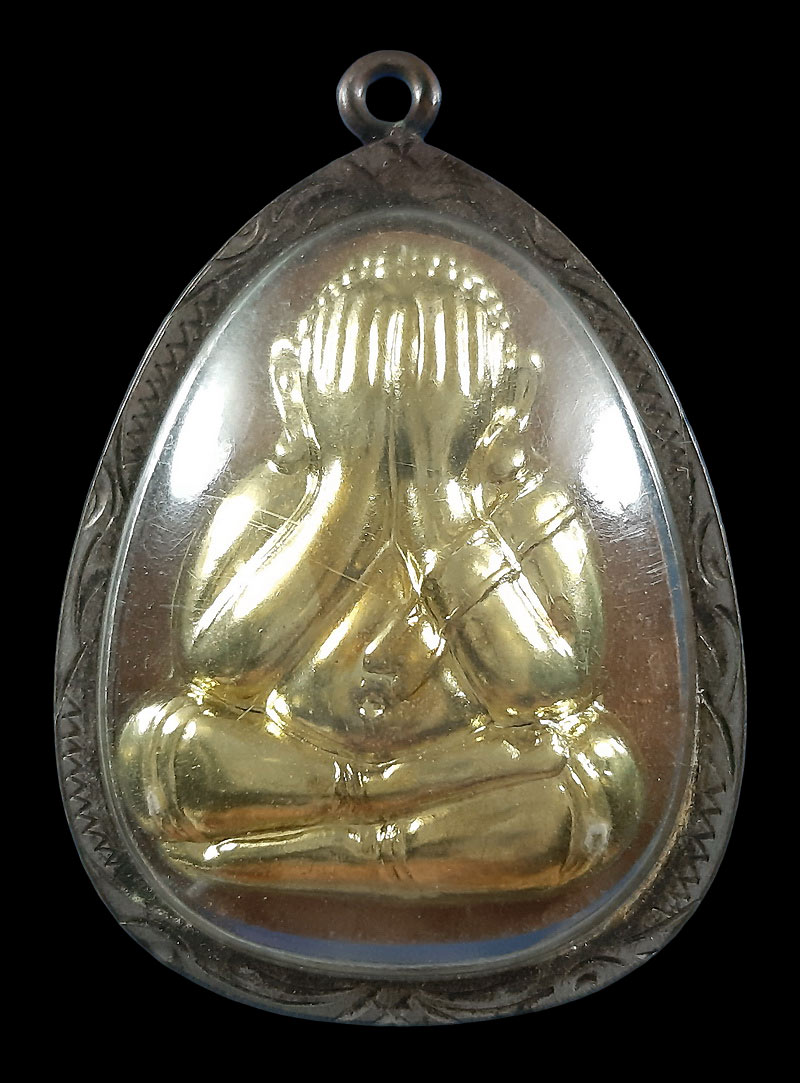 พระปิดตาหลวงพ่อคูณ วัดบ้านไร่ เนื้อผงหน้ากากทองเหลือง เลี่ยมกรอบไมครอน 