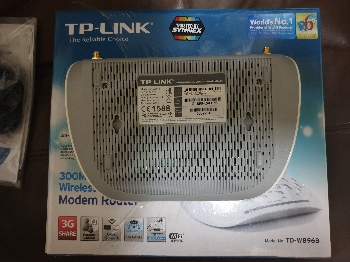 TP-LINK 300 Mbps. Wireless N USB ADSL 2+ Modem Router Model No. TD-W8968