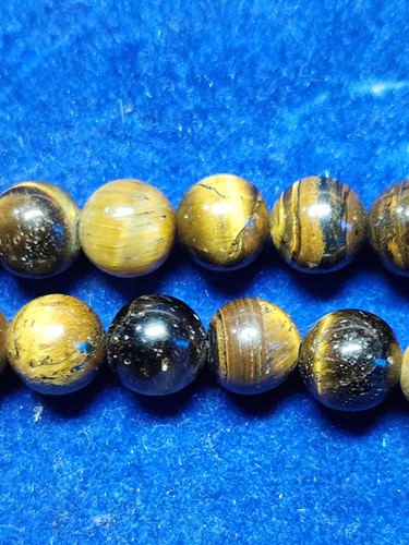 สร้อย คตไม้สัก ขนาด 10 มม ยาว 28 นิ้ว จำนวน 74 เม็ด 