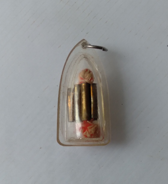 ตะกรุดเก้ากุ่มเลี่ยมพลาสติก