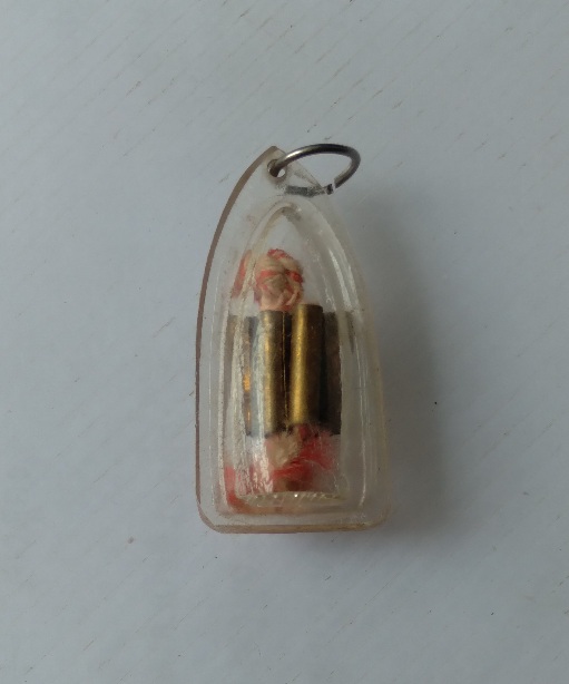 ตะกรุดเก้ากุ่มเลี่ยมพลาสติก