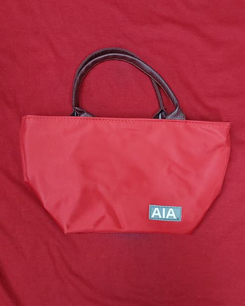(ปิด39-)กระเป๋าหูหิ้ว AIA สีแดง 4.7x10.5นิ้ว (สภาพไม่ได้ใช้)