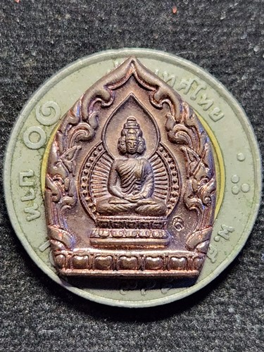 หรียญพระเศรษฐีนวโกฏิ สถาบันพยากรณ์ศาสตร์ อาจารย์ลักษณ์ เรขานิเทศ จัดสร้างปี 2553 ตอกโค๊ต