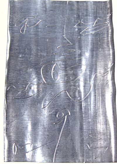 ตะกรุดเนื้อตะกั่ว ยาว ๓ นิ้ว