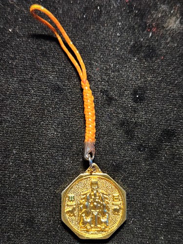 เหรียญแปดเหลี่ยมไท้ส่วยเอี๊ยด้านหลังยันต์โป๊ยก่วย12ราศี