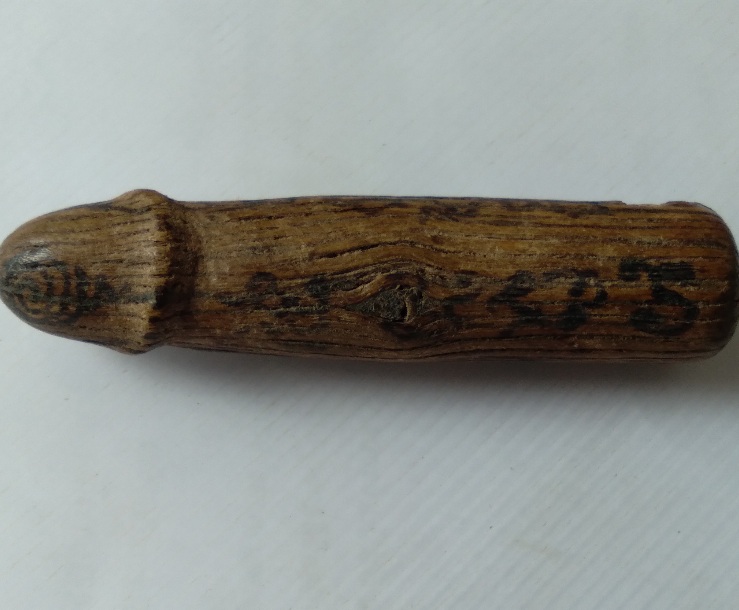 ปลัดขิกไม้แกะไม่ทราบที่