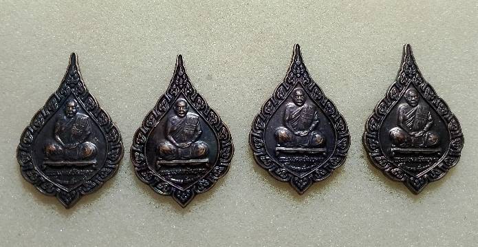 เหรียญรุ่นแรก พระมงคลวัฒนคุณ วัดถ้ำไตรรัตน์ ปากช่อง นครราชสีมา  4 เหรียญ 