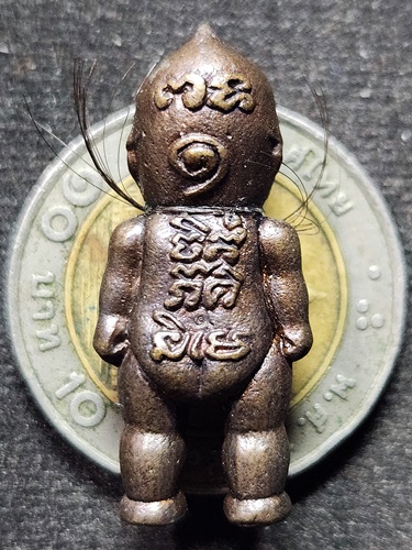 วัดในเตา ตรัง หุ่นพยนต์ อ.ประสูติ ปิยธัมโม รุ่นมงคล9  เนื้อโลหะอาถรรภ์ 