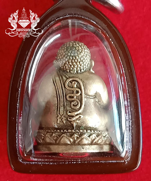 พระสังกัจจายน์รับทรัพย์ ก้นอุดผง มีฐาน รุ่นไตรมาส ๒๕๕๔ 