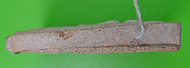 พระผงหลังรูปเหมือนหลวงพ่อเที่ยง วัดพระพุทธบาทเขากระโดง บุรีรัมย์ .2731.