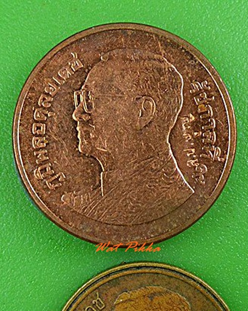 เหรียญขวัญถุง(เงินเรียกเงิน) หลวงปู่บุญ วัดแสงน้อย อุบลราชธานี .4210.