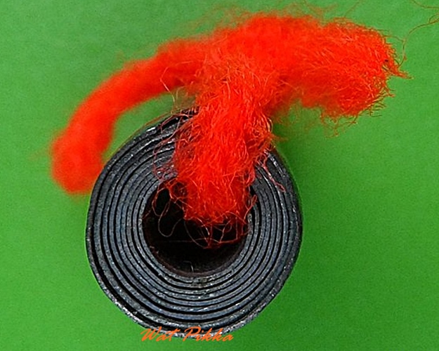 ตะกรุดลูกอมพระพิรุณแสนห่า หลวงปู่สิงห์ วัดบ้านขี้เหล็ก ศรีสะเกษ .4231.