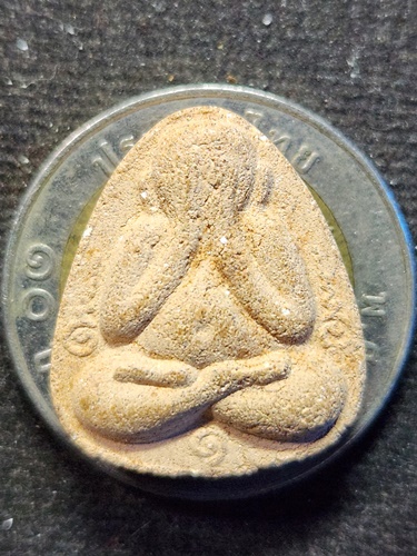 วัดพระธาตุพนม อ.เมือง จ.นครพนม  พระปิดตาข้างยันต์อุ  เนื้อผงว่าน รุ่น  ๑  ปี2518 