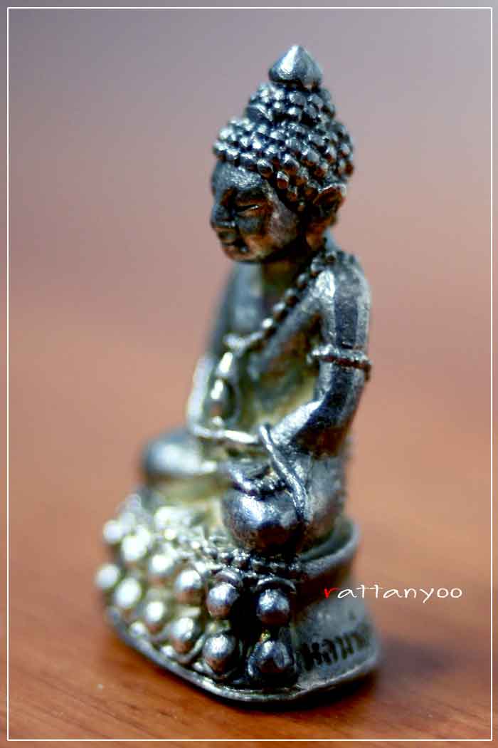 หลวงพ่อคูณ พระกริ่ง แช่น้ำมนต์ หมายเลข 345 เนื้อเงิน + บัตร 