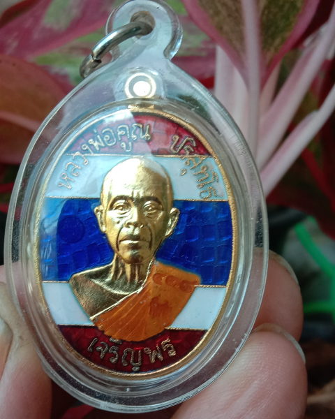 หลวงพ่อคูณ"เจริญพร91"บล็อคแรกปี36เนื้อทองทิพย์ลงยาธงชาติเลี่ยมพร้อมใช้สวยกริ๊บ