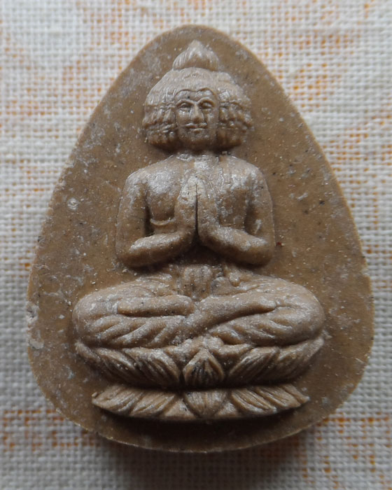 พระเศรษฐีนวโกฎิ อุณมิลิต