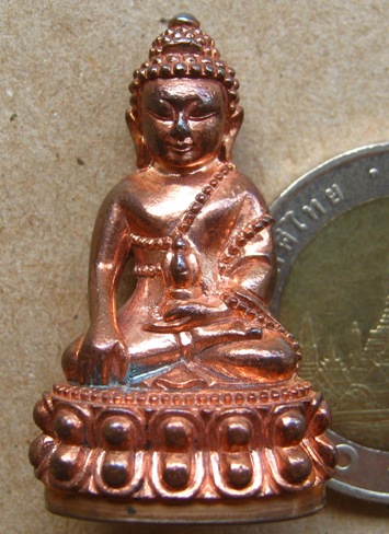 พระ(กริ่งทองใบหยก)รุ่นแรก หลวงพ่อทอง วัดเขายายหอม ชัยภูมิ ปี2556เนื้อทองบวบแดง หนัก2บาท เลข407+รอยจา